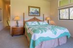The master bedroom features a king sized bed and small private lanai